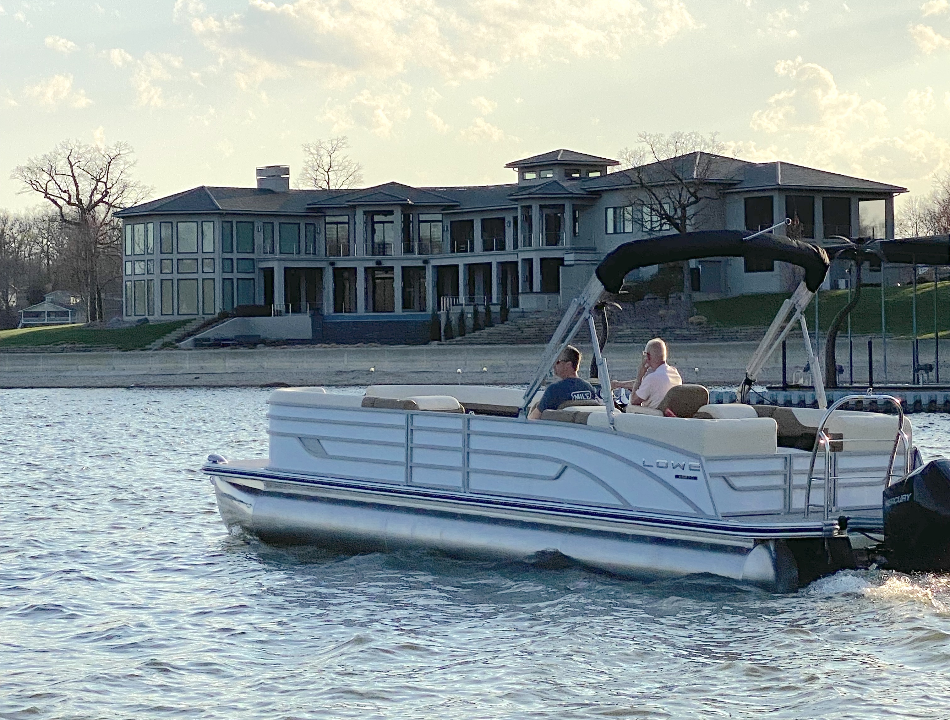 People on Pontoon Boat on on water near Rocky Mount MO